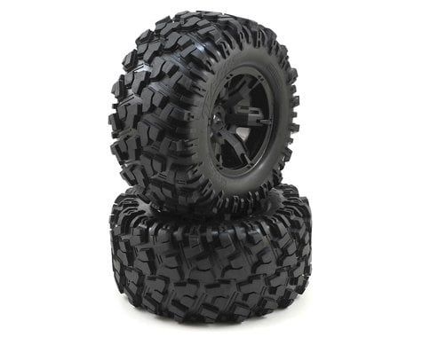 TRA7772X Traxxas Tires & wheels, assembled, glued (X-Maxx black wheels, Maxx AT tires, foam inserts) (left & right) (2)