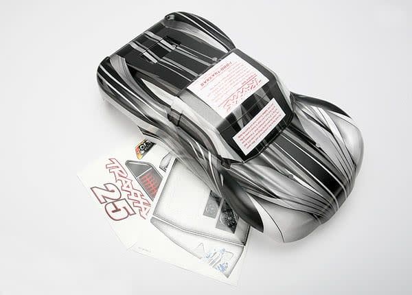 TRA7012X Traxxas Body, 1/16 Slash, ProGraphix (replacement for painted body. Graphics are painted - requires paint and final color application)/ decal sheet