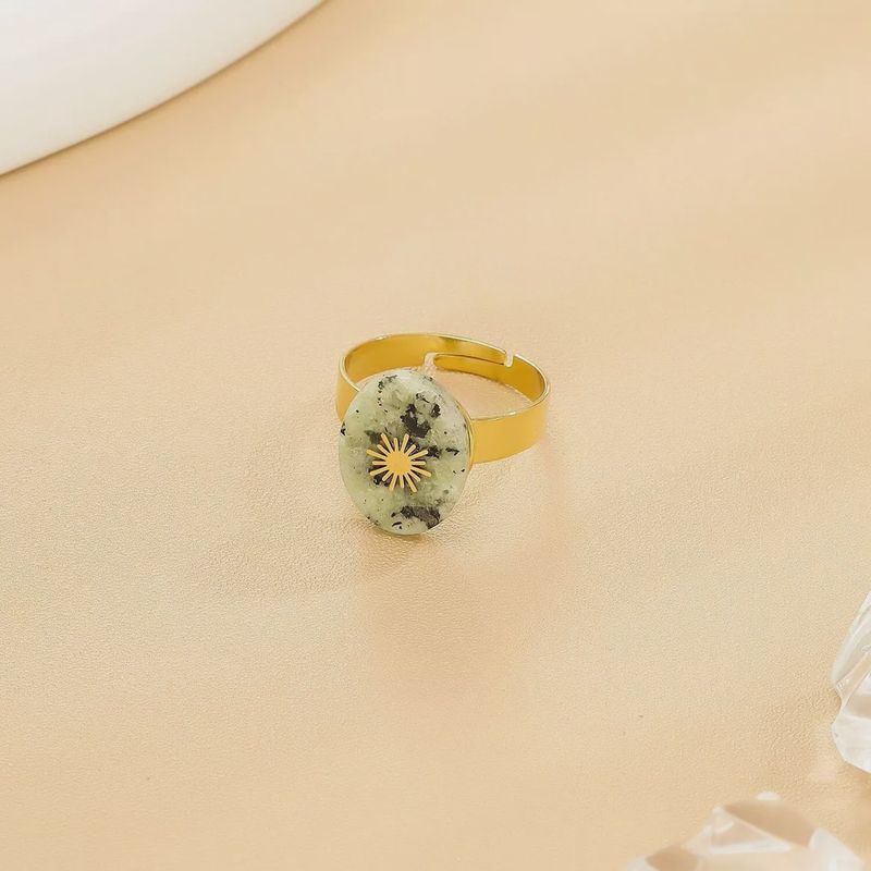 Ring zon groen/goud