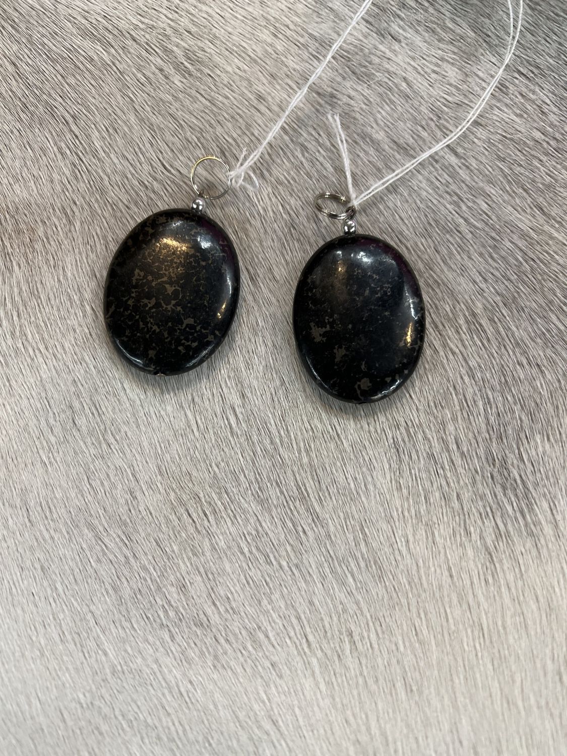 ASSORTED BLACK STONE PENDANTS