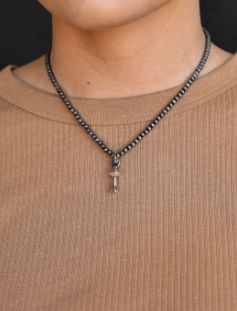 WEST &amp; CO. DAINTY FAUX NAVAJO PEARL NECKLACE WITH BLOSSOM CHARM