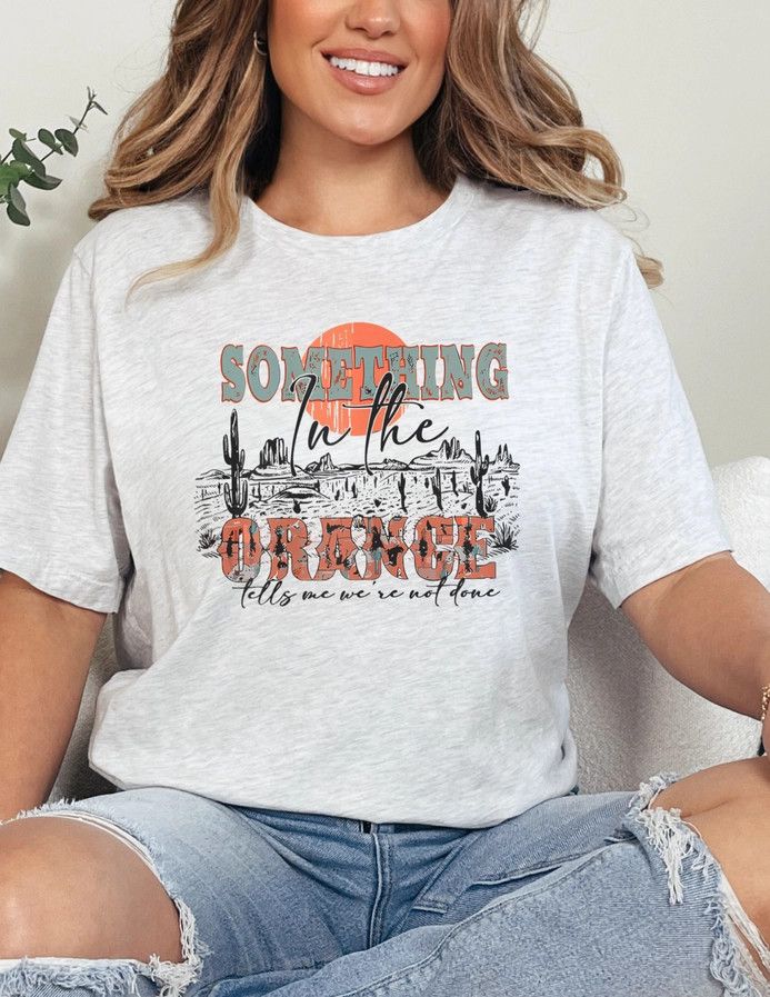 SOMETHING IN THE ORANGE TEE