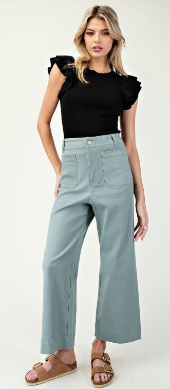RUFFLE SLEEVELESS TOP