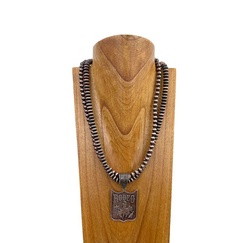 DOUBLE COPPER NAVAJO BEADS WITH RODEO PENDANT