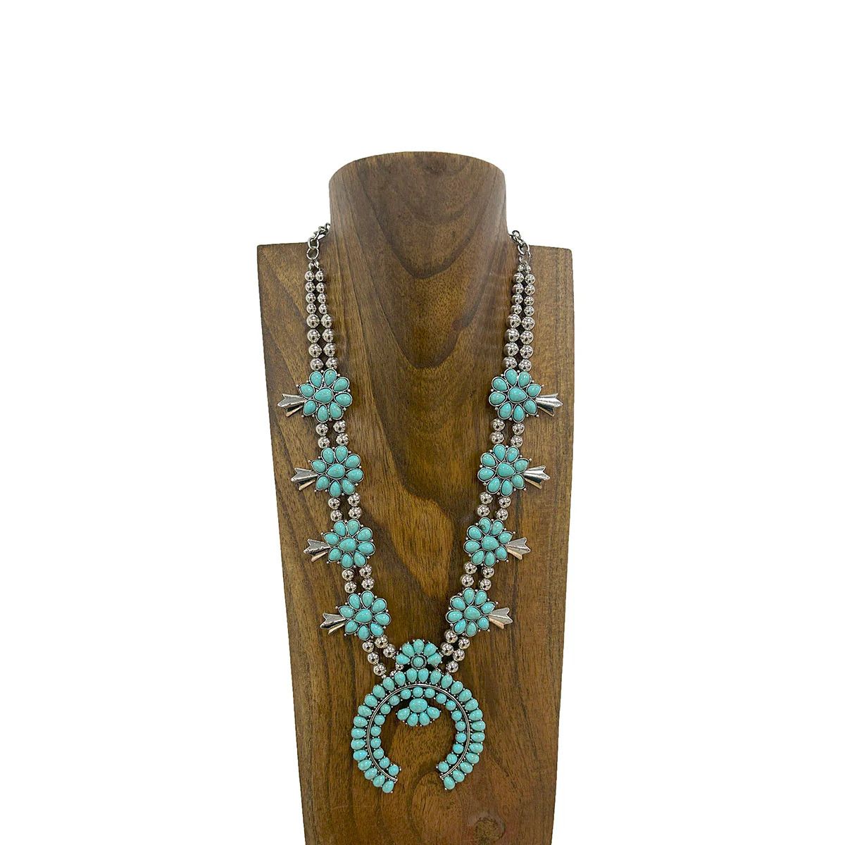 SILVER METAL AND TURQUOISE STONES AND C PENDANT