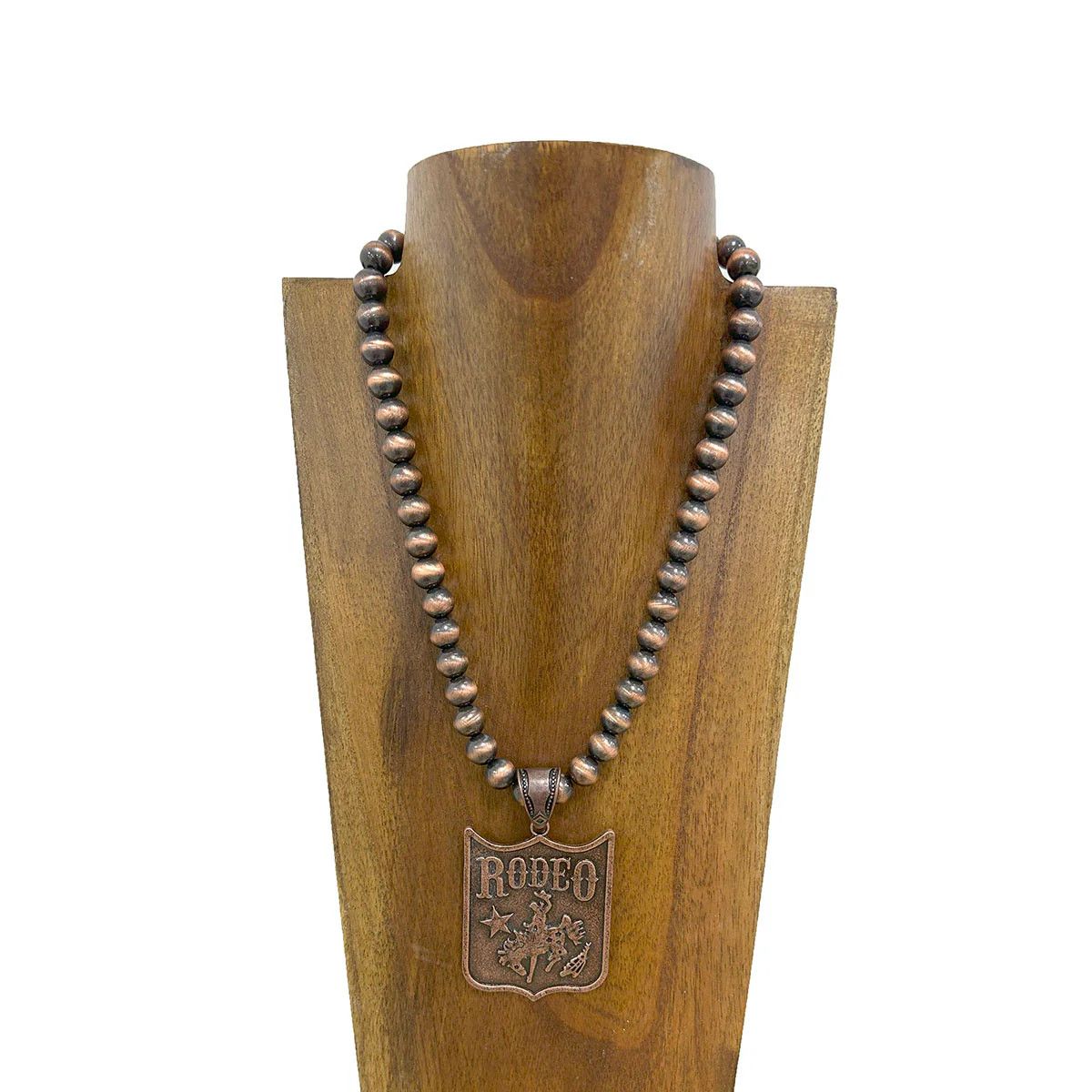 COPPER NAVAJO PEARL BEADS WITH METAL RODEO PENDANT