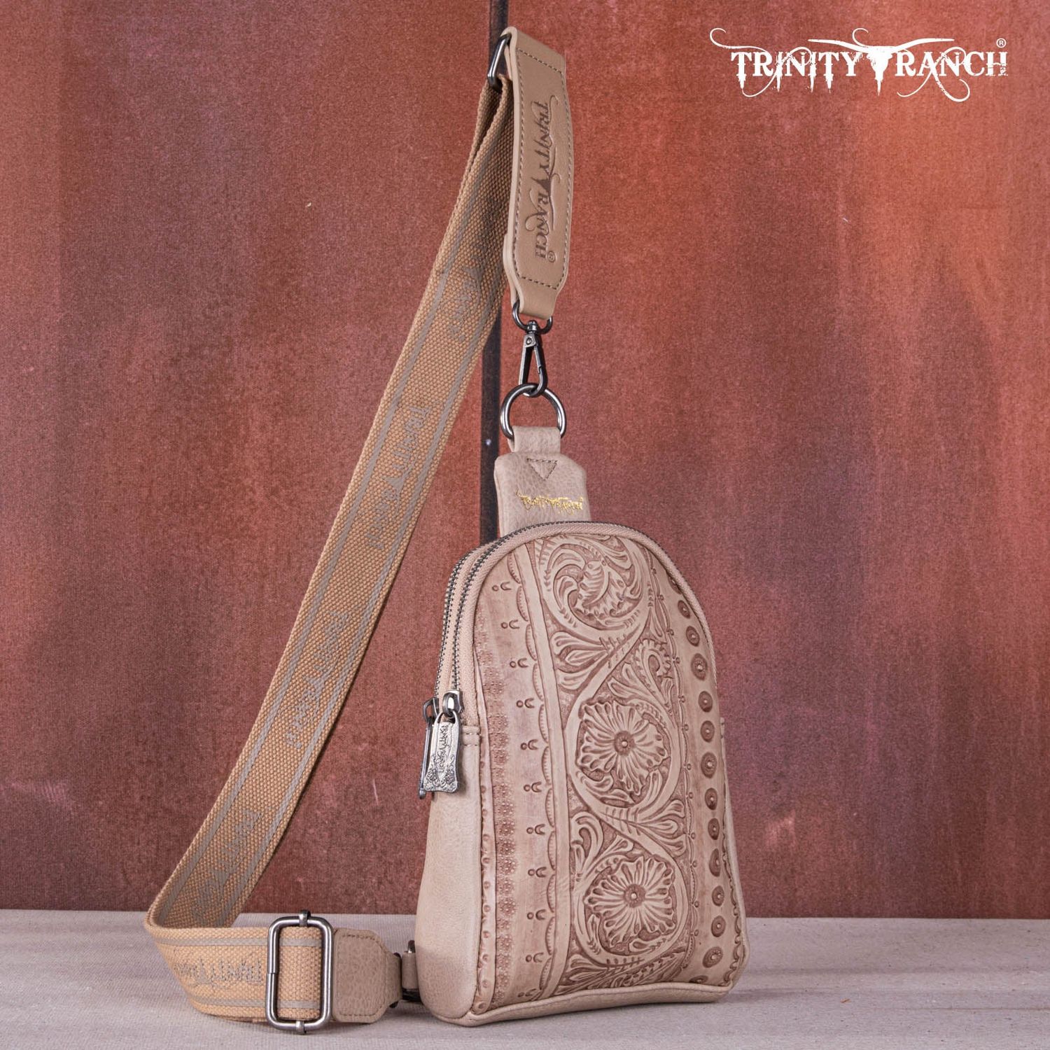 TRINITY RANCH FLORAL TOOLED SLING BAG, Color: TAN