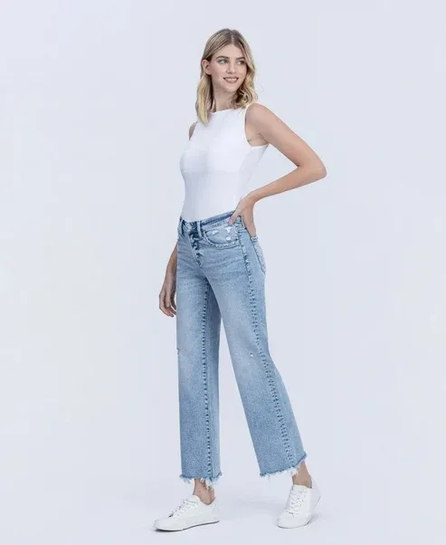 VERVET MID RISE RAW HEM SLIM WIDE LEG JEAN