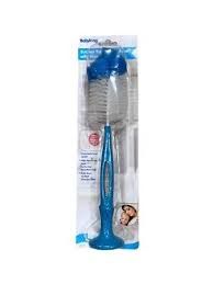 Suction base bottle brush with nipple cleaner