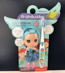 Kids toothbrush with toy doll