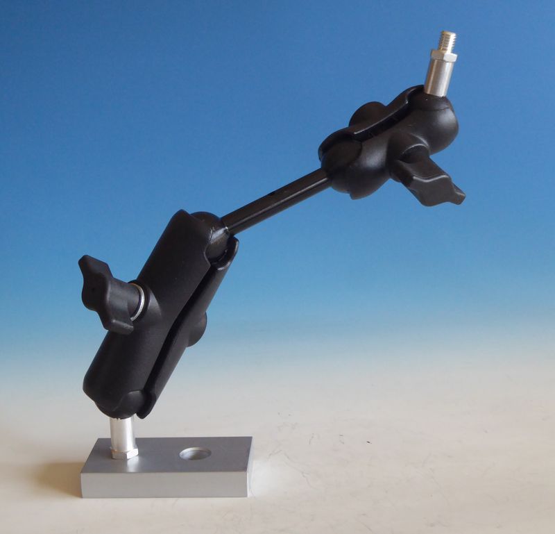 Düsenhalter mit Kugelelementen und Grundplatte