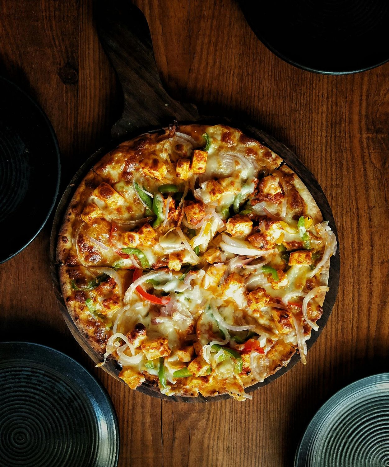 Paneer Tikka Pizza (Cheese, Paneer, Onions, Tomatoes and Chilies)