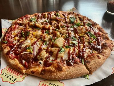 Chicken Barbeque Pizza (Cheese, Marinated Chicken in a BBQ sauce, Onion and BBQ sauce)