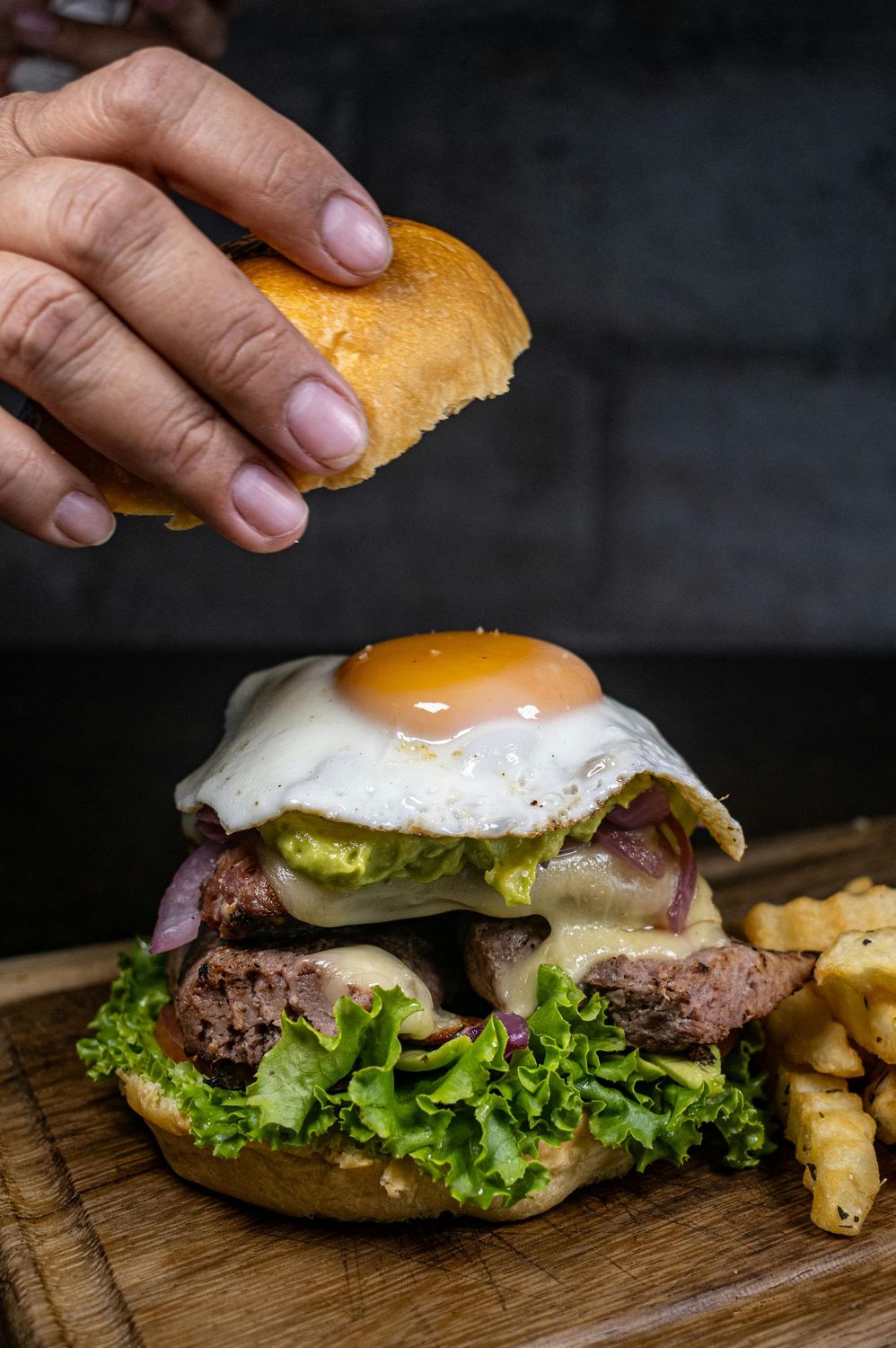 Egg Burger	Beef Patty (topped with Fried Egg in a Bun with Tomato, Cucumber,and Lettuce with French Fries and Coleslaw)