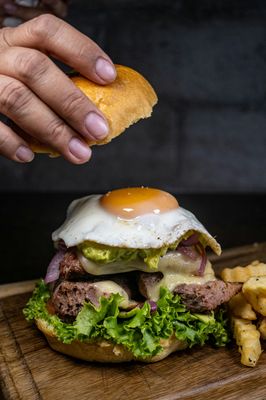 Egg Burger	Beef Patty (topped with Fried Egg in a Bun with Tomato, Cucumber,and Lettuce with French Fries and Coleslaw)