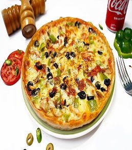 A flavorful Pizza Mexicana with a crispy crust, topped with spicy ground beef, melted cheese, fresh jalapeños, red onions, and diced tomatoes. The vibrant toppings add a burst of color, and the cheese is golden and bubbly at the edges. Served hot on a rustic wooden board, ready to enjoy for a spicy, satisfying bite.