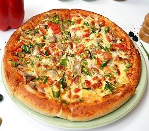 
A vibrant Pizza Vegetarian topped with an assortment of fresh vegetables, including bell peppers, onions, tomatoes, olives, and mushrooms, layered over melted mozzarella cheese on a crispy, golden crust. The colorful toppings add a fresh, appetizing look, making it a perfect choice for veggie lovers. Served hot on a rustic wooden board, ready to enjoy.