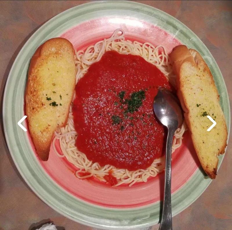 "Spaghetti Alla Napolitana at Pizza Corner UAE - Classic Italian Pasta with Fresh Tomato Sauce and Herbs"