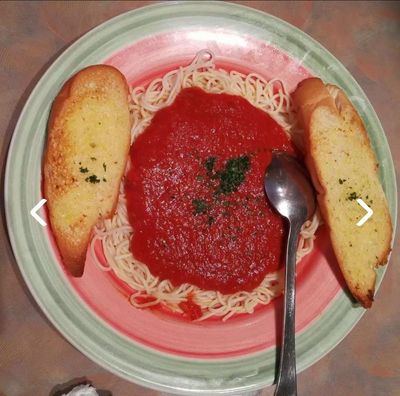 "Spaghetti Alla Napolitana at Pizza Corner UAE - Classic Italian Pasta with Fresh Tomato Sauce and Herbs"