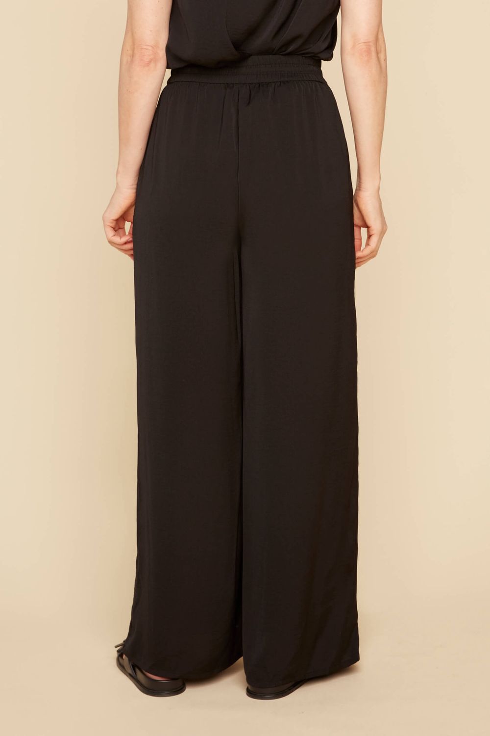 Pantalon noir large avec taille élastique et cordon
