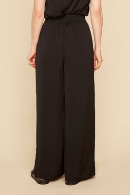 Pantalon noir large avec taille élastique et cordon