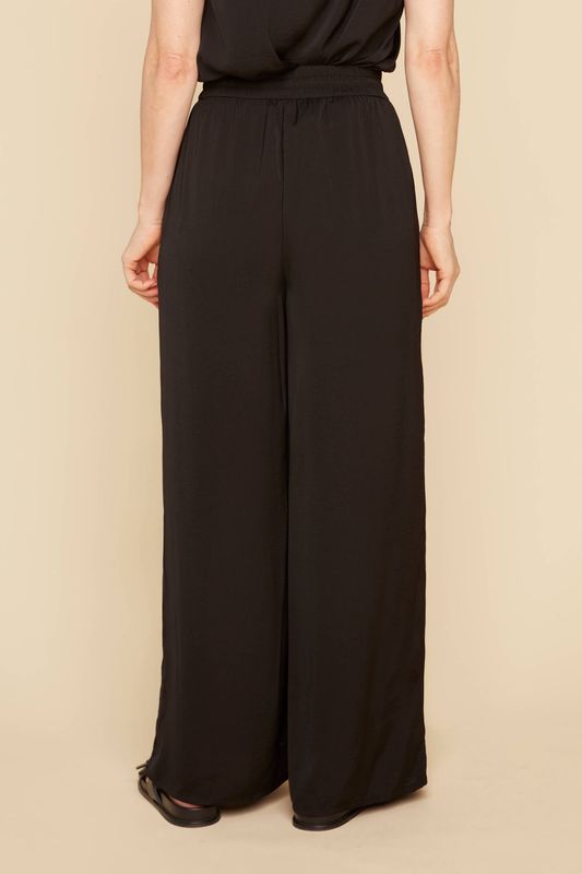 Pantalon noir large avec taille élastique et cordon