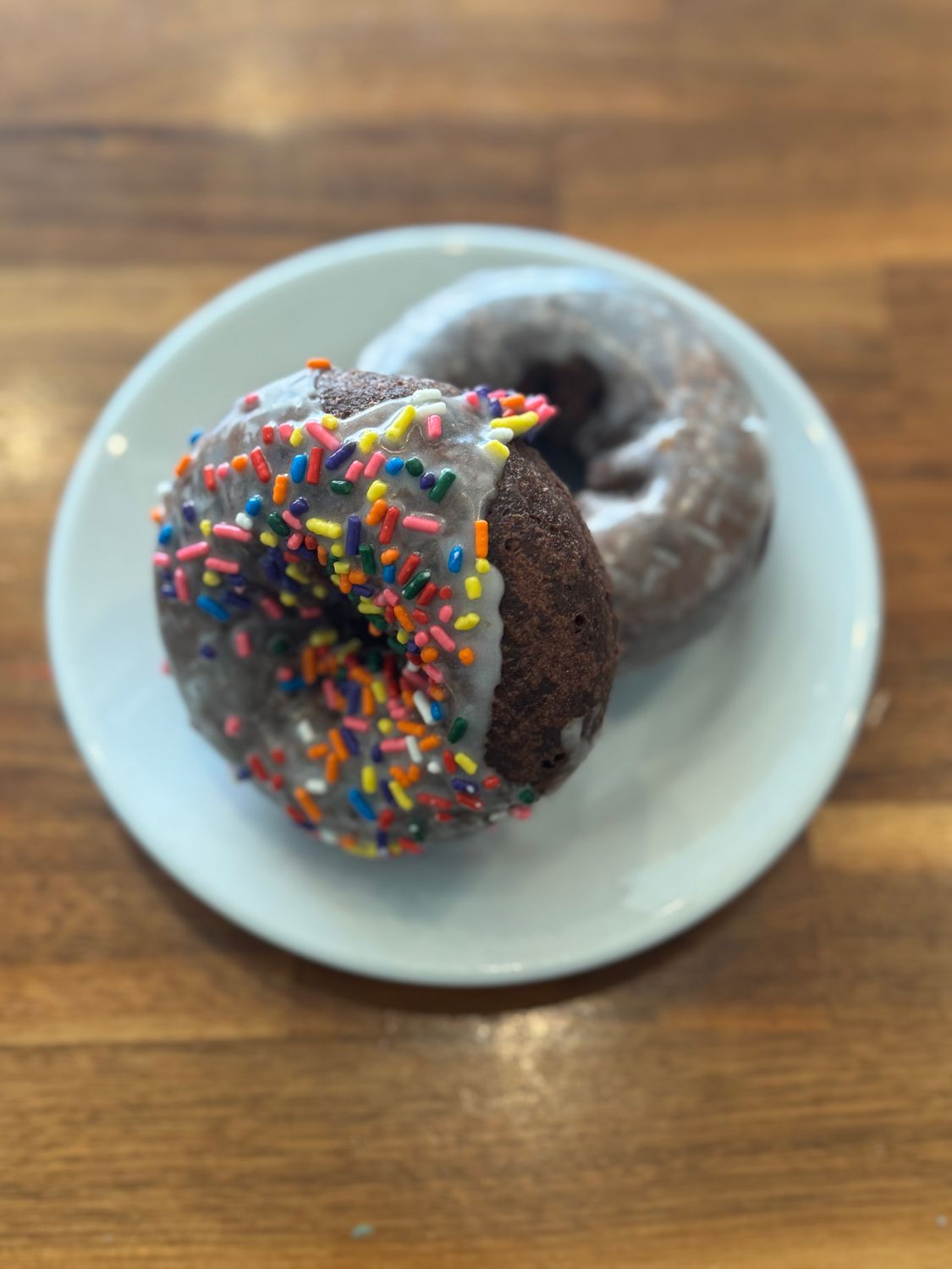 Sprinkled Chocolate Cake Donut - Vanilla Glazed