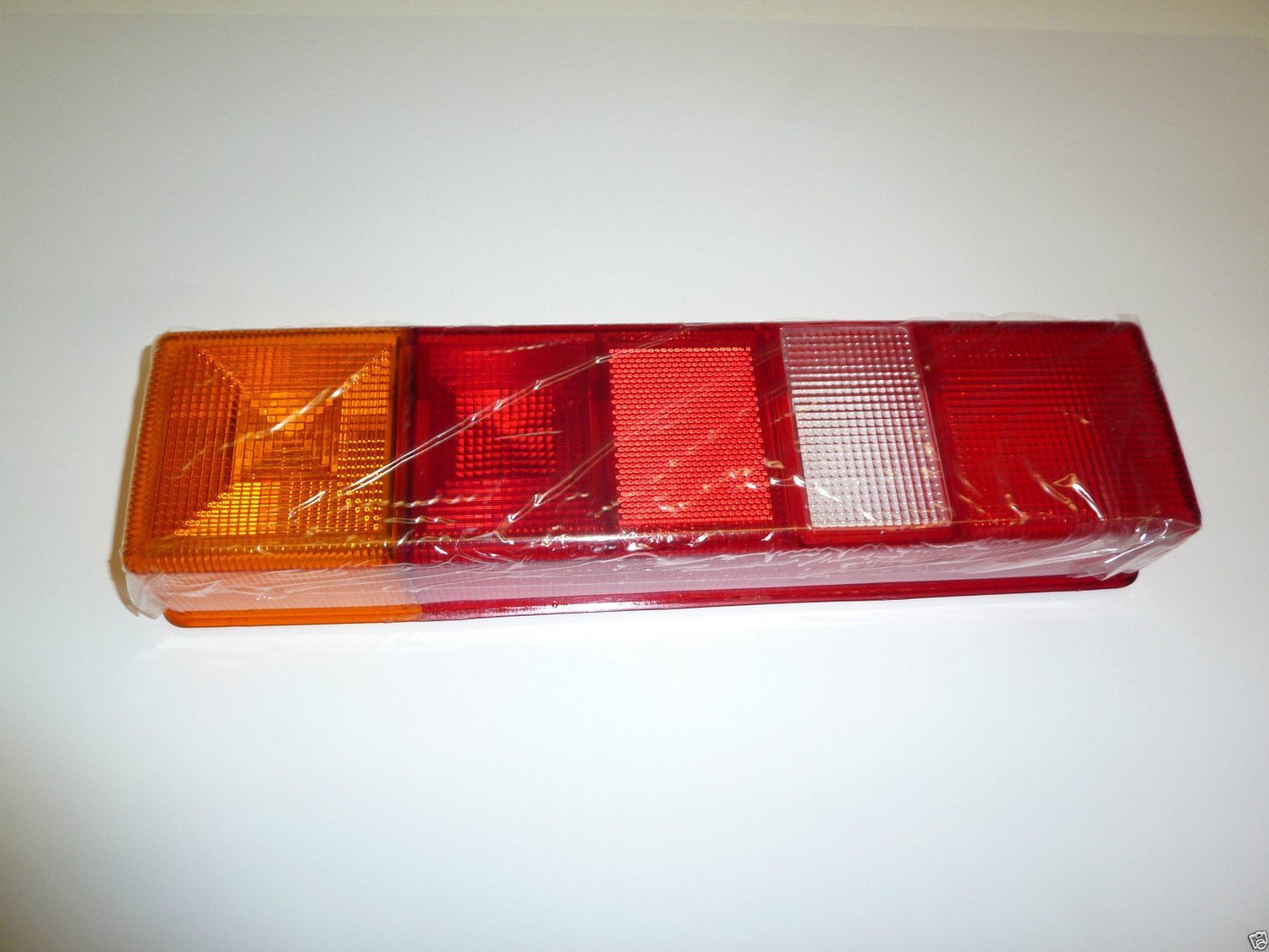 Ford Transit 1985 to 2014 o/s or n/s rear truck light lens only