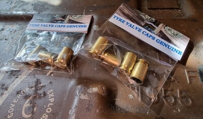 Cartridge case wheel valve covers