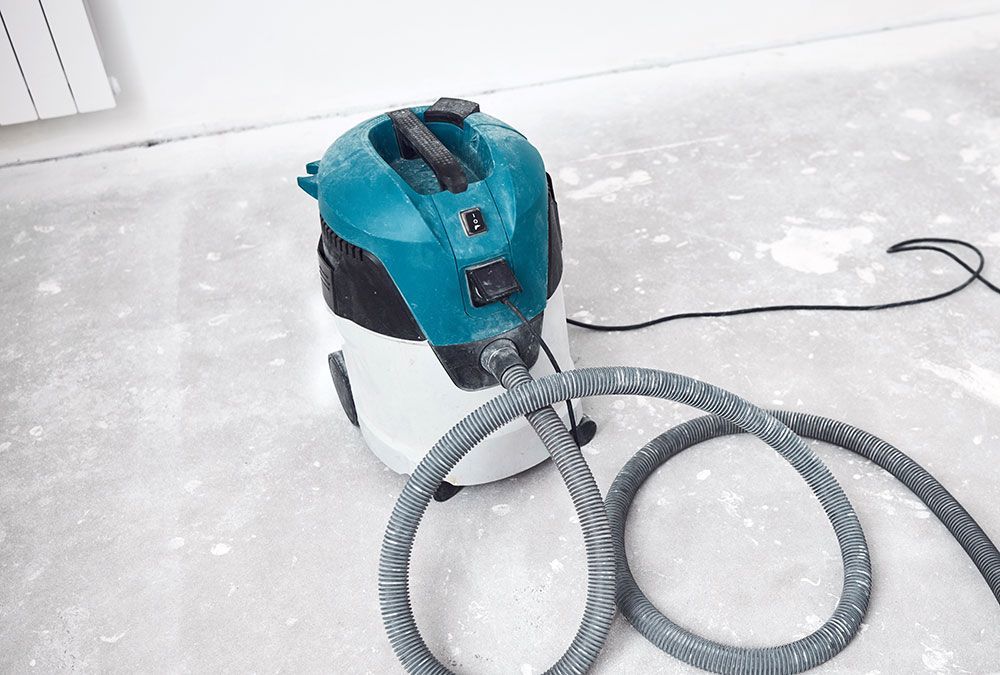 Aspirateur bleu et blanc