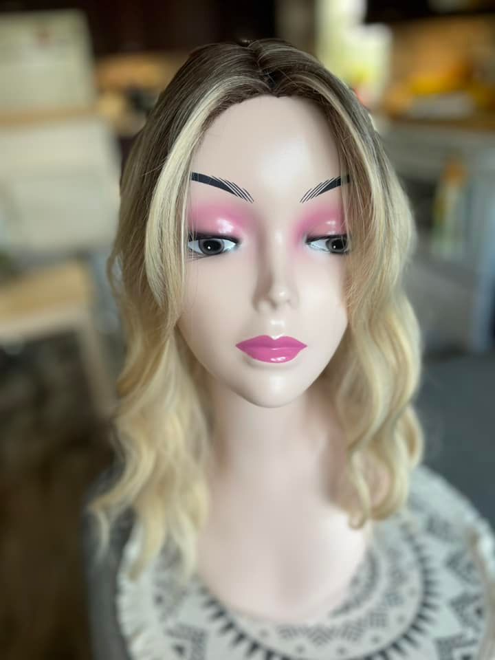 Long soft blonde highlights with long fringe bangs