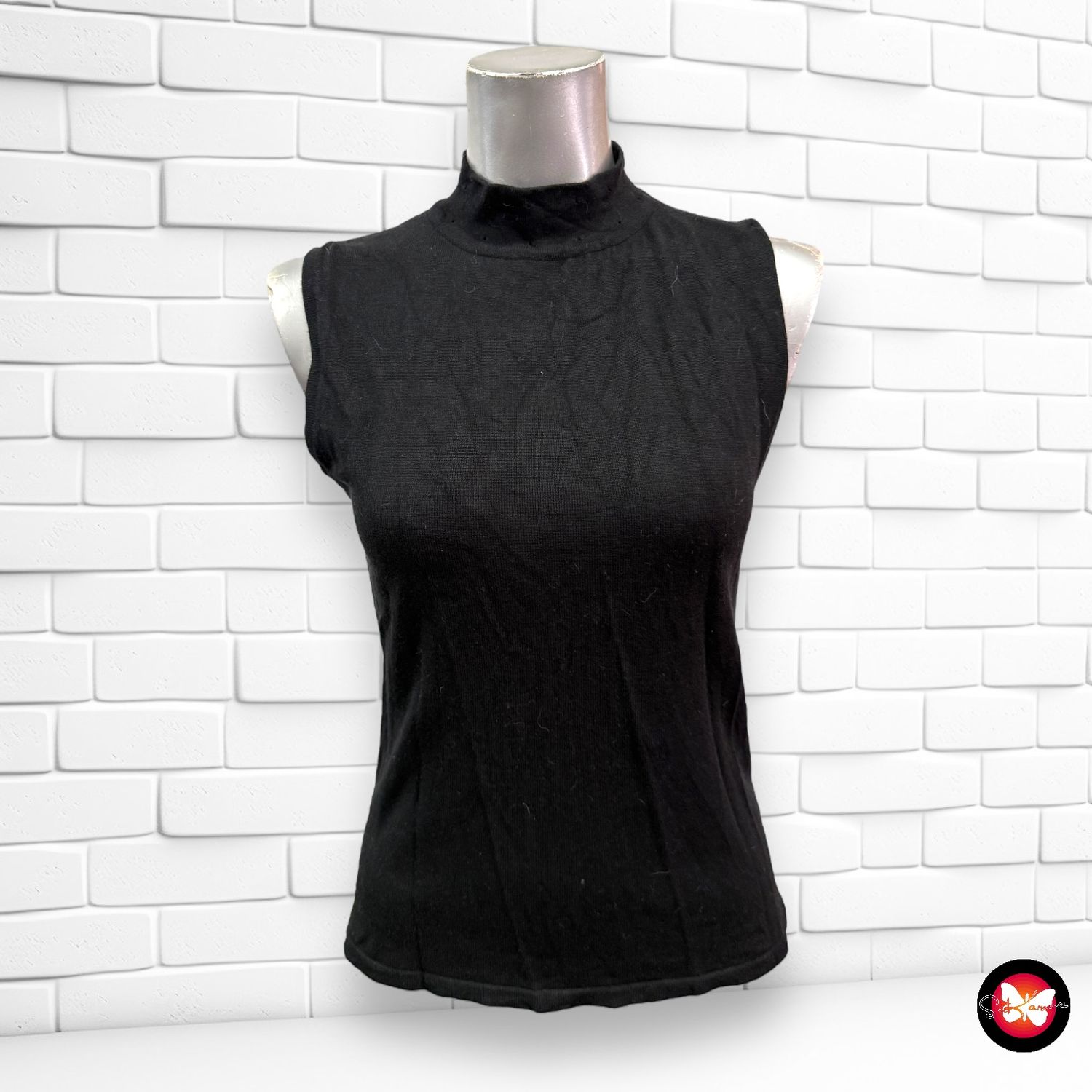 **SALES** Jersey sin mangas y cuello cerrado BAGUTTI Talla M/L