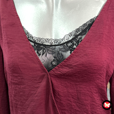 Vestido con encaje en el escote BERSHKA Talla S