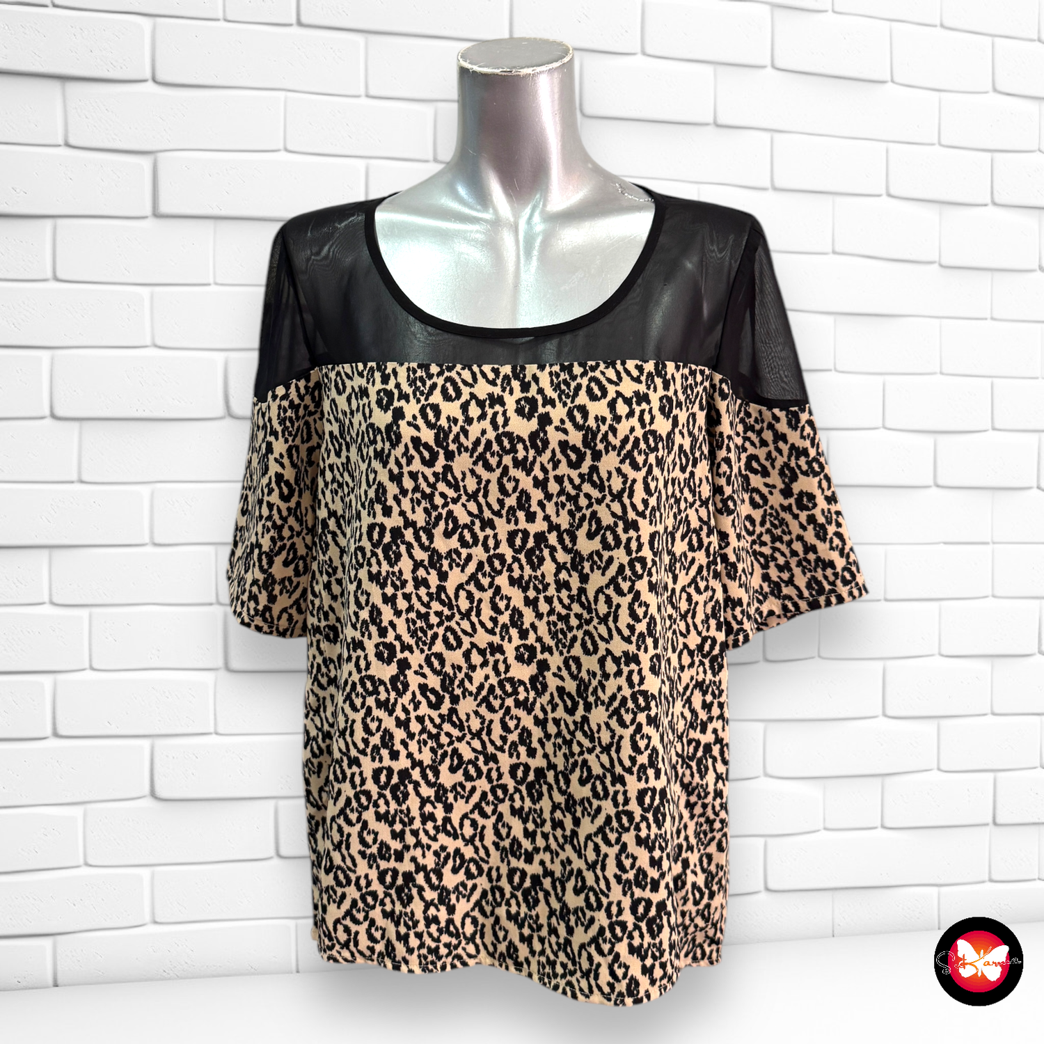 Blusa de animal print Talla L