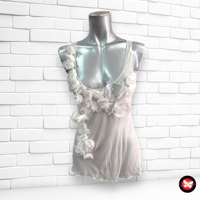 Blusa translúcida con plumas Talla M