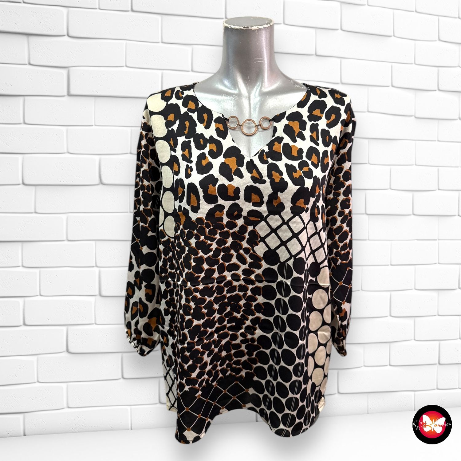 Blusa de media manga con detalle cadena Talla L