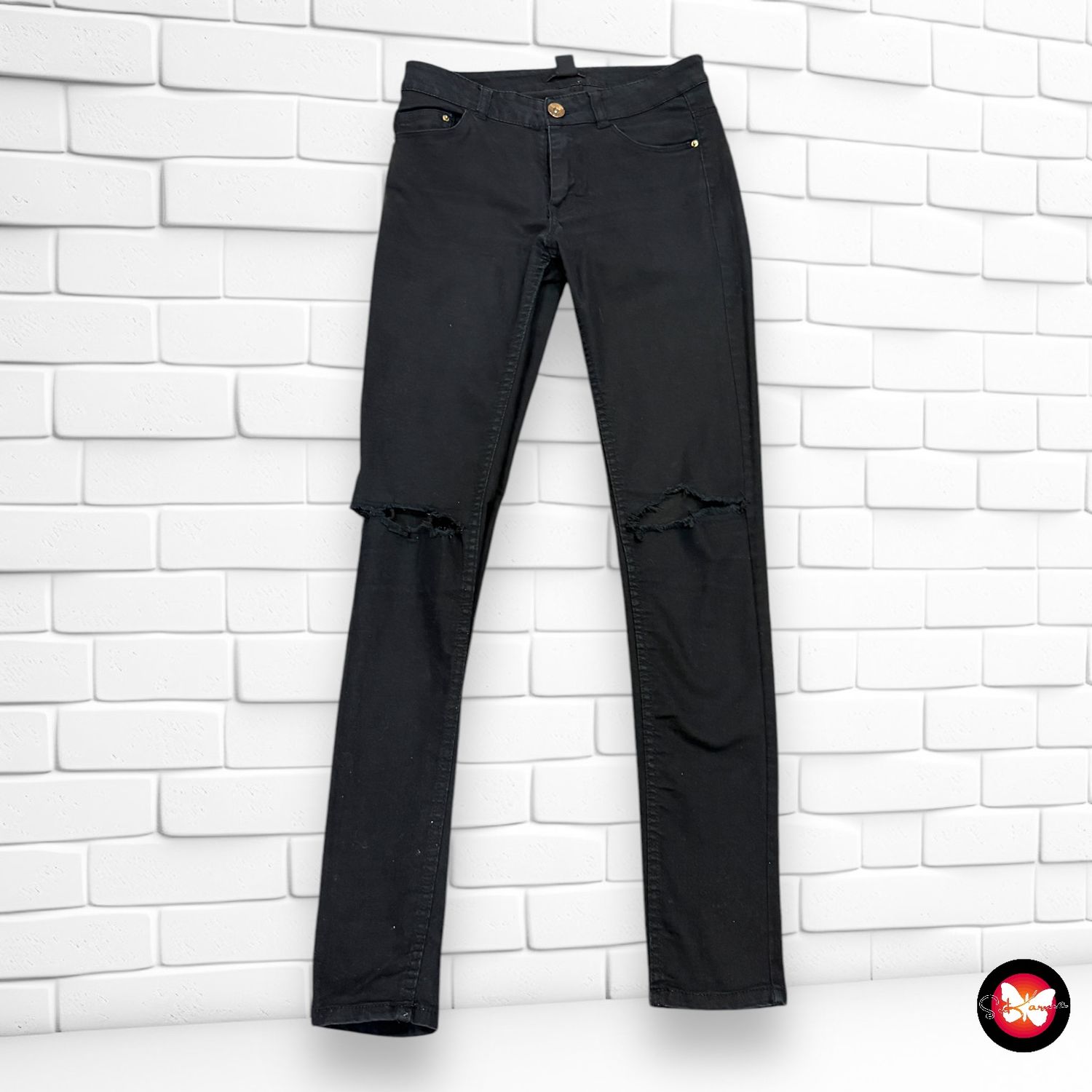 Pantalón vaquero con rotitos H&amp;M Talla 34