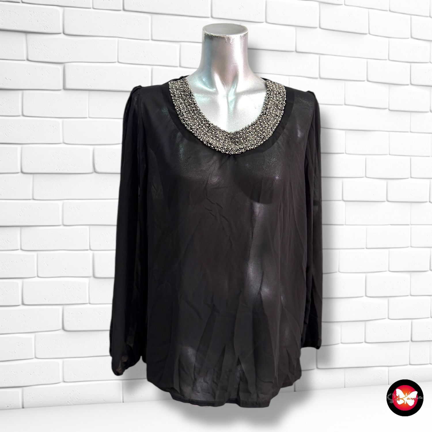Blusa con pedrería Talla M/L