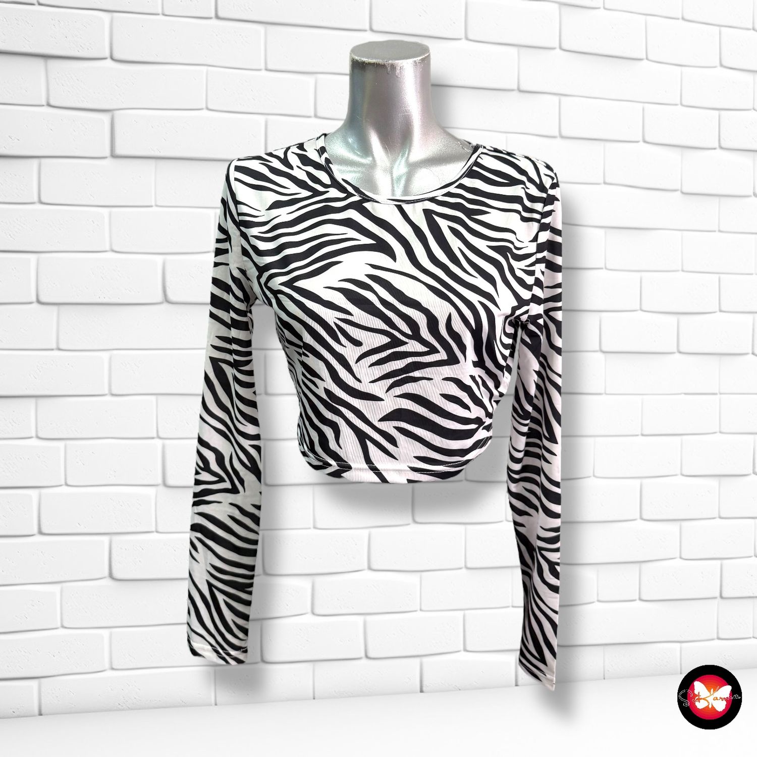 Blusa cropped de cebra Talla M