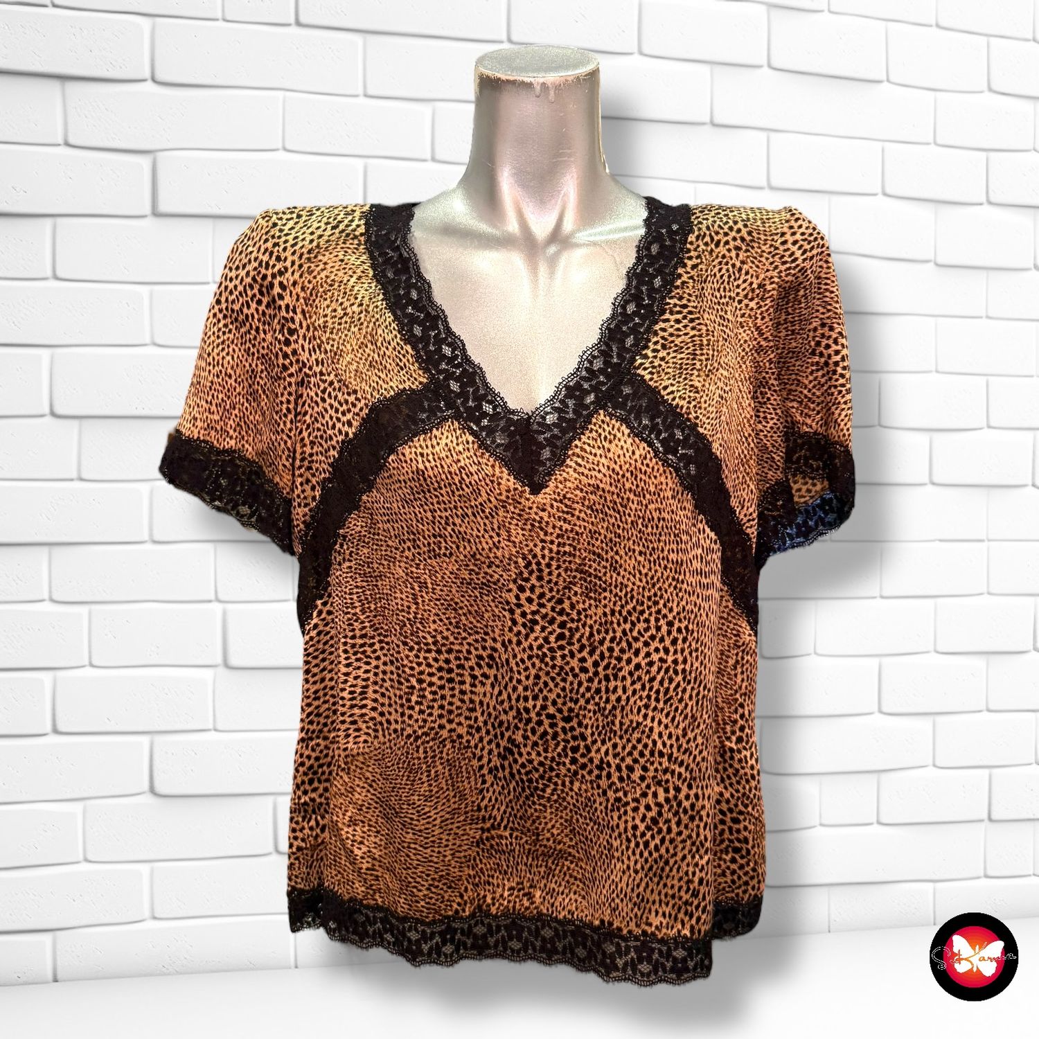 Blusa con estampado animal print Talla 46
