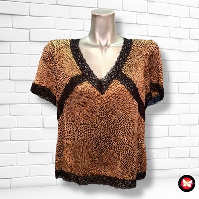 Blusa con estampado animal print Talla 46