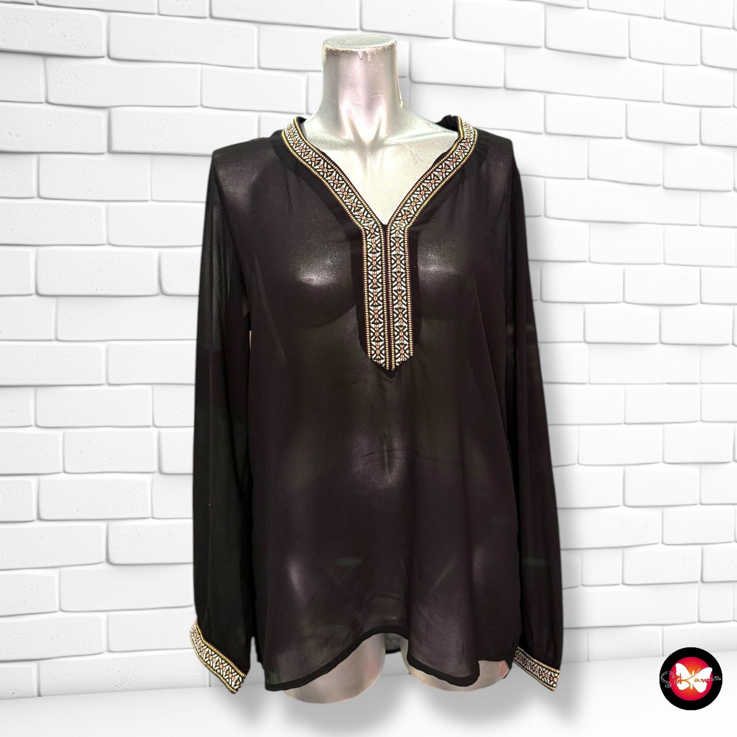 Blusa traslúcida Talla M/L