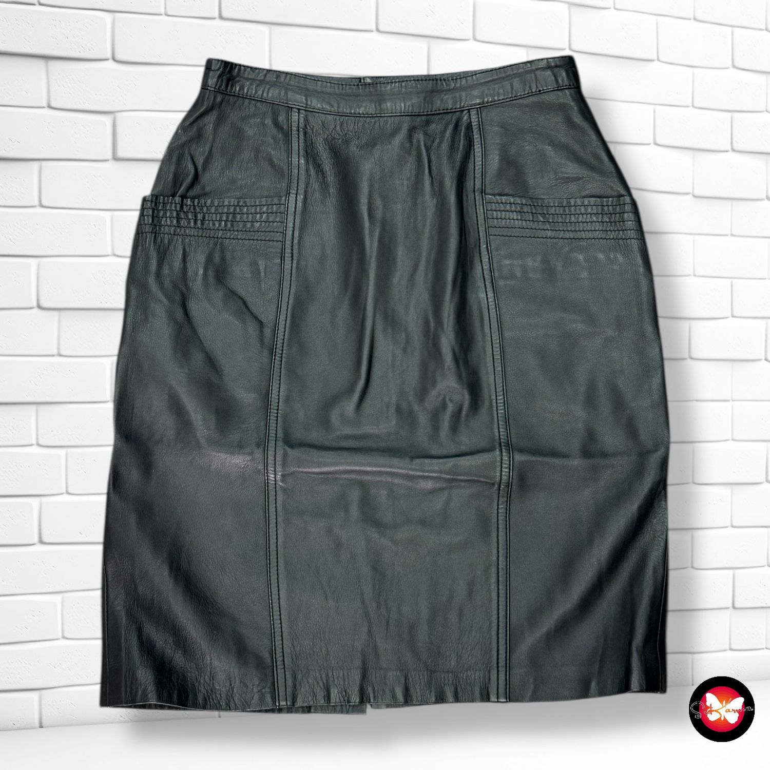 Falda midi de piel con bolsillos Talla M