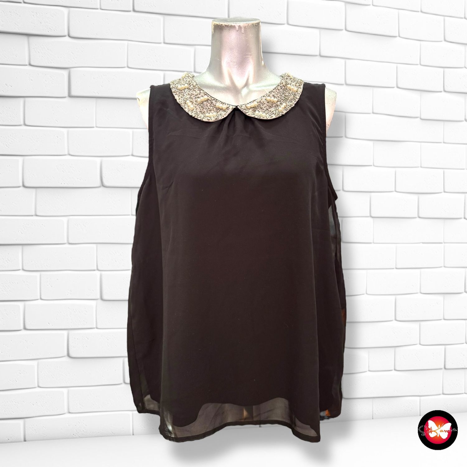 Blusa con pedrería y cuello babero CLOCKHOUSE Talla M