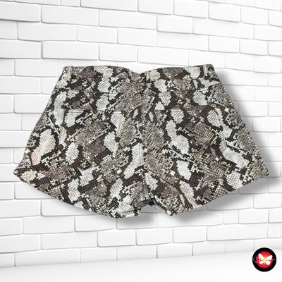 Short vaquero estampado serpiente H&amp;M Talla 42