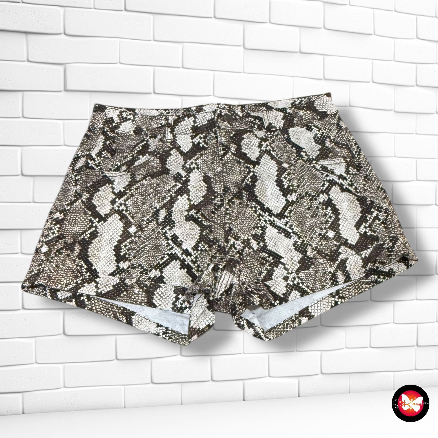 Short vaquero estampado serpiente H&amp;M Talla 42