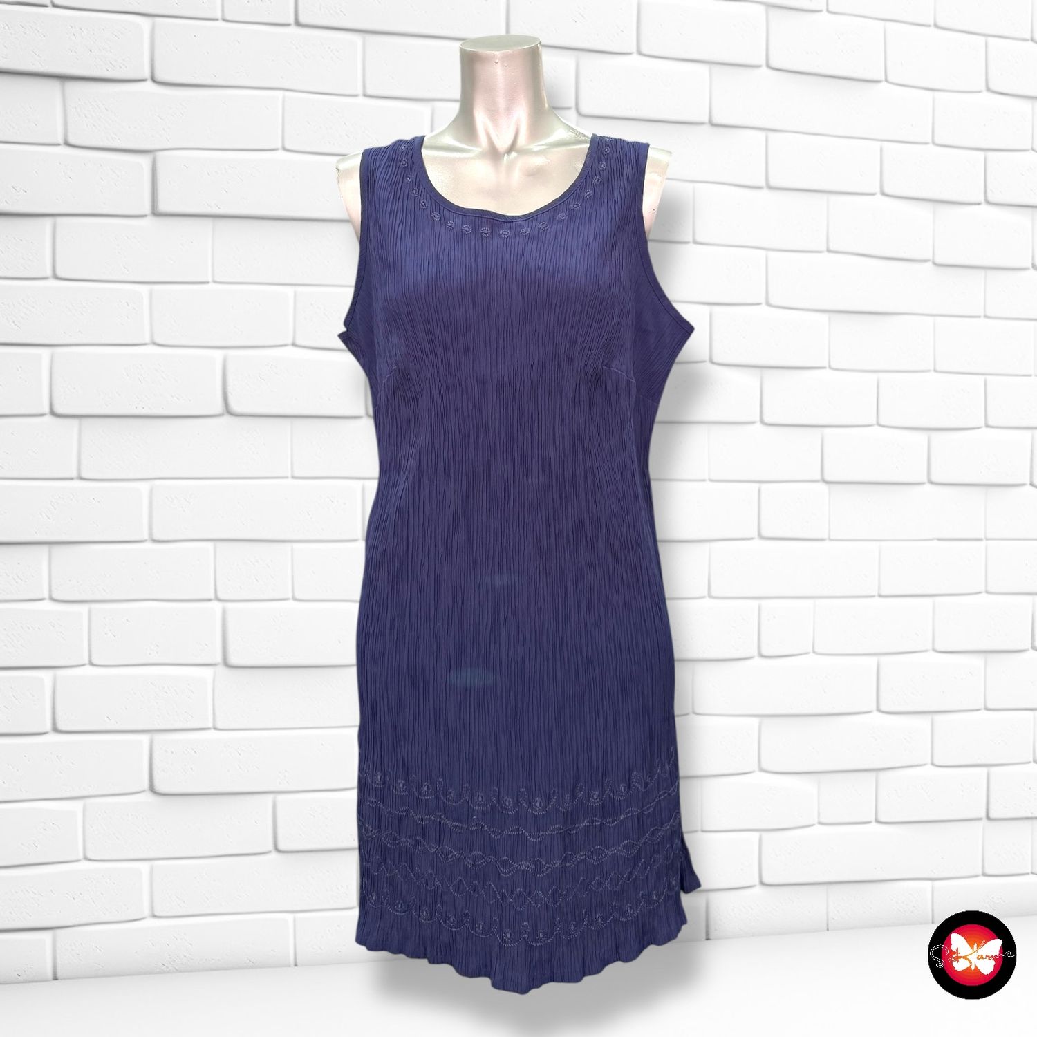 **HOY** Blusa sin mangas plisada Talla 52