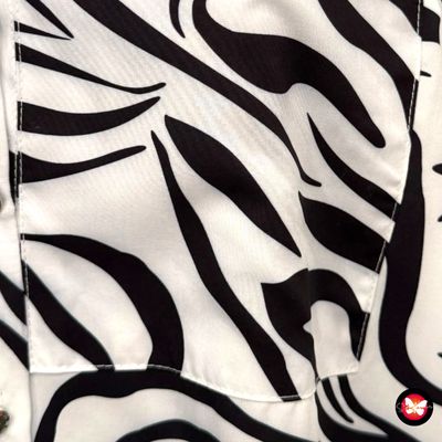 **HOY** Camisa estampado cebra Talla XL