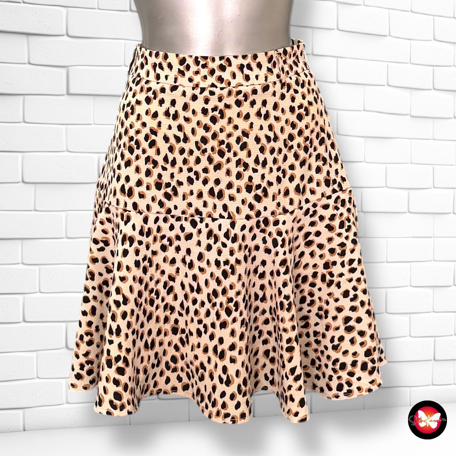 **HOY** Falda animal print con vuelo COSTES Talla M