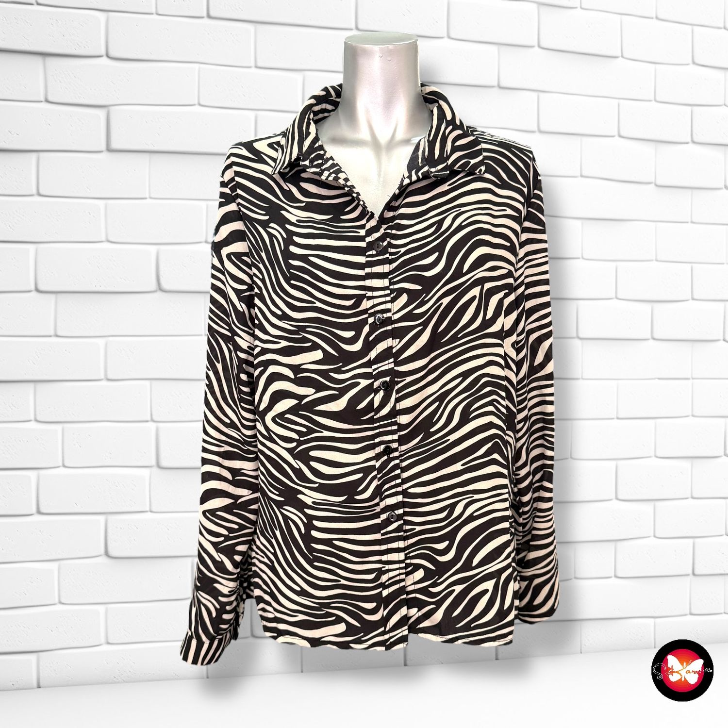 **HOY** Camisa de manga larga estampado cebra Talla 40